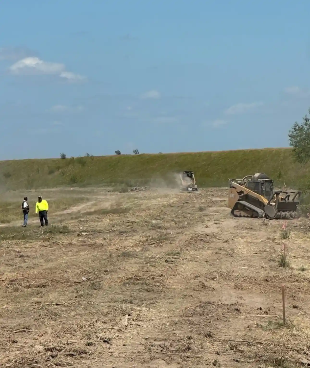 On-site crew managing a project for land clearing services in New Braunfels TX